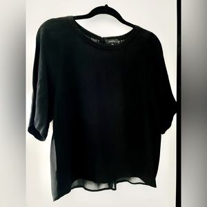 Babaton black sheer short sleeved blouse.